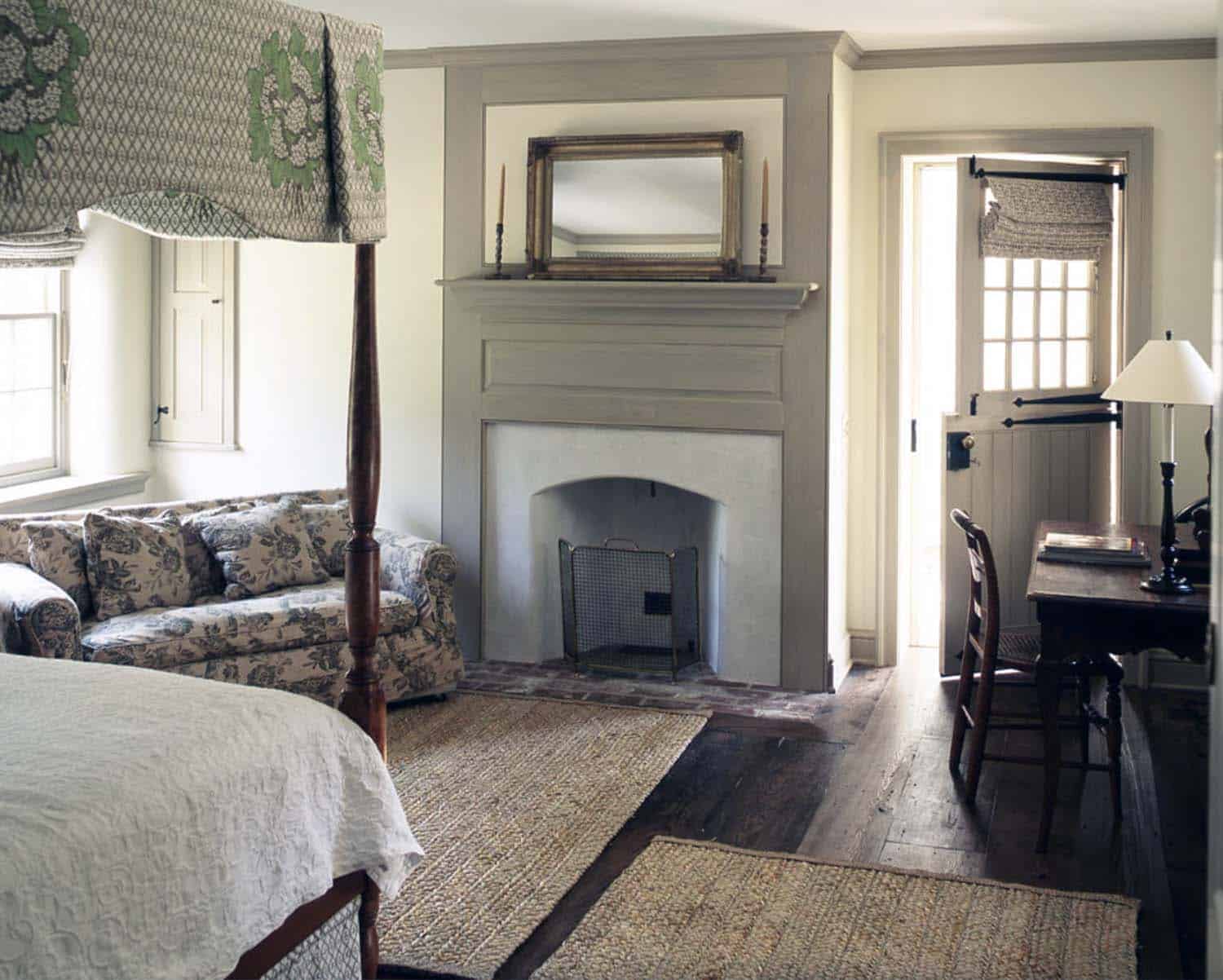traditional-farmhouse-bedroom-with-a-fireplace
